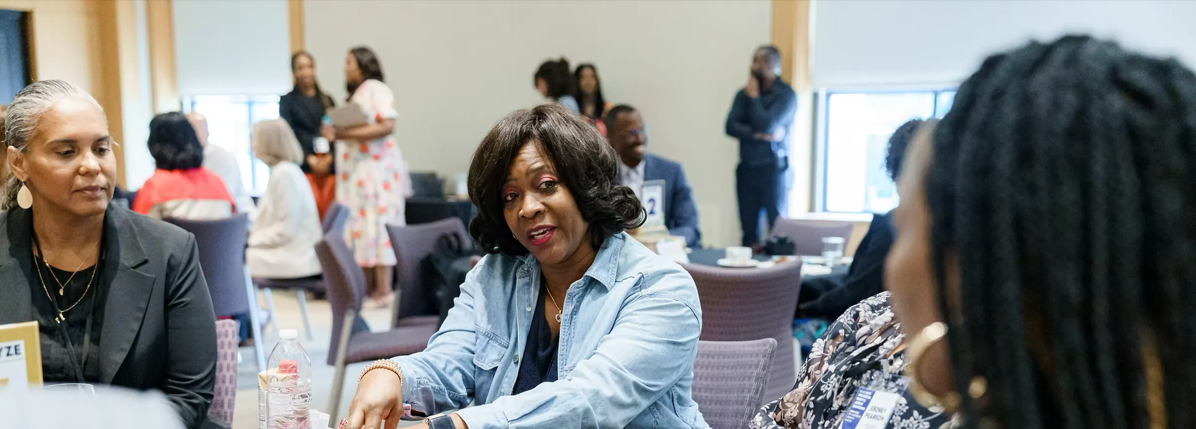 Black Equity Collective members in a meeting discussion