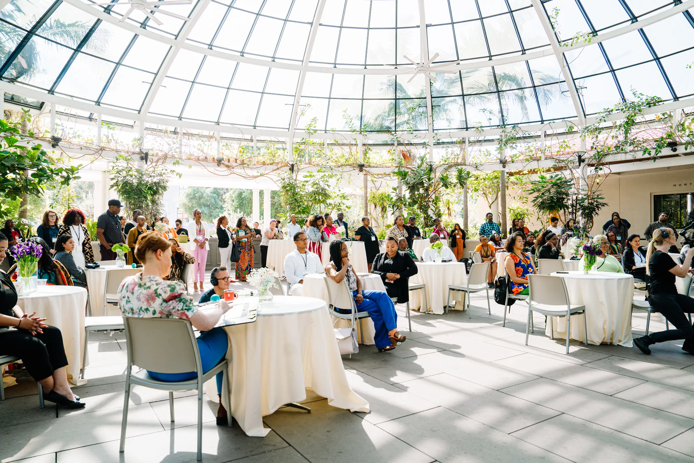 Black Equity Collective convening event with attendees at round tables