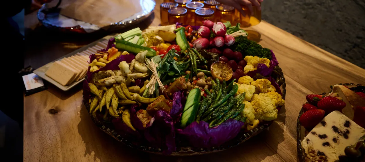 Spread of food at the Collective Conversations fireside chat with Mayor Karen Bass